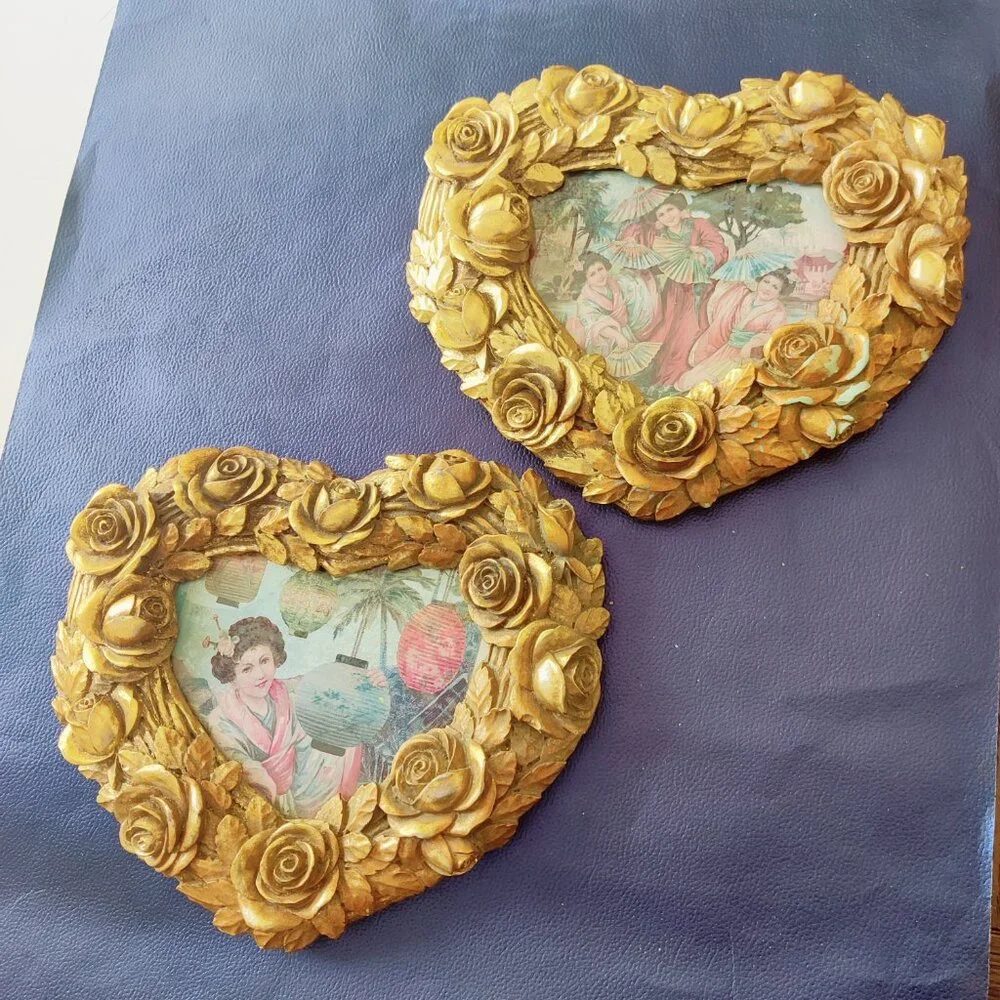 Picture Frames from Nordstroms a heavy gold heart frame with Roses & Leaf Border